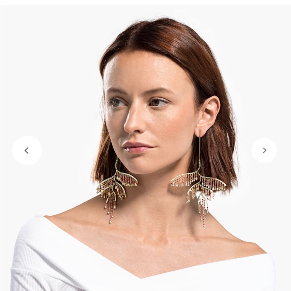 Swarovski earrings.